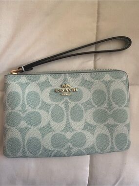 Coach corner zip wristlet in light blue